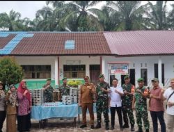 Polsek Bandar Pulau Hadiri Launching Program Makan Bergizi Gratis di Aek Songsongan